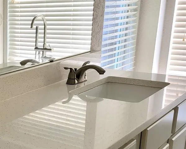 a close view of a sink and a window