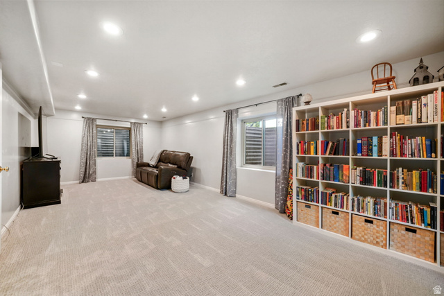 357 South 320 W Street Lindon, UT 84042 - Photo 24 of 41 Spacious room featuring light-toned carpet flooring, recessed ceiling lighting, and multiple windows with horizontal blinds