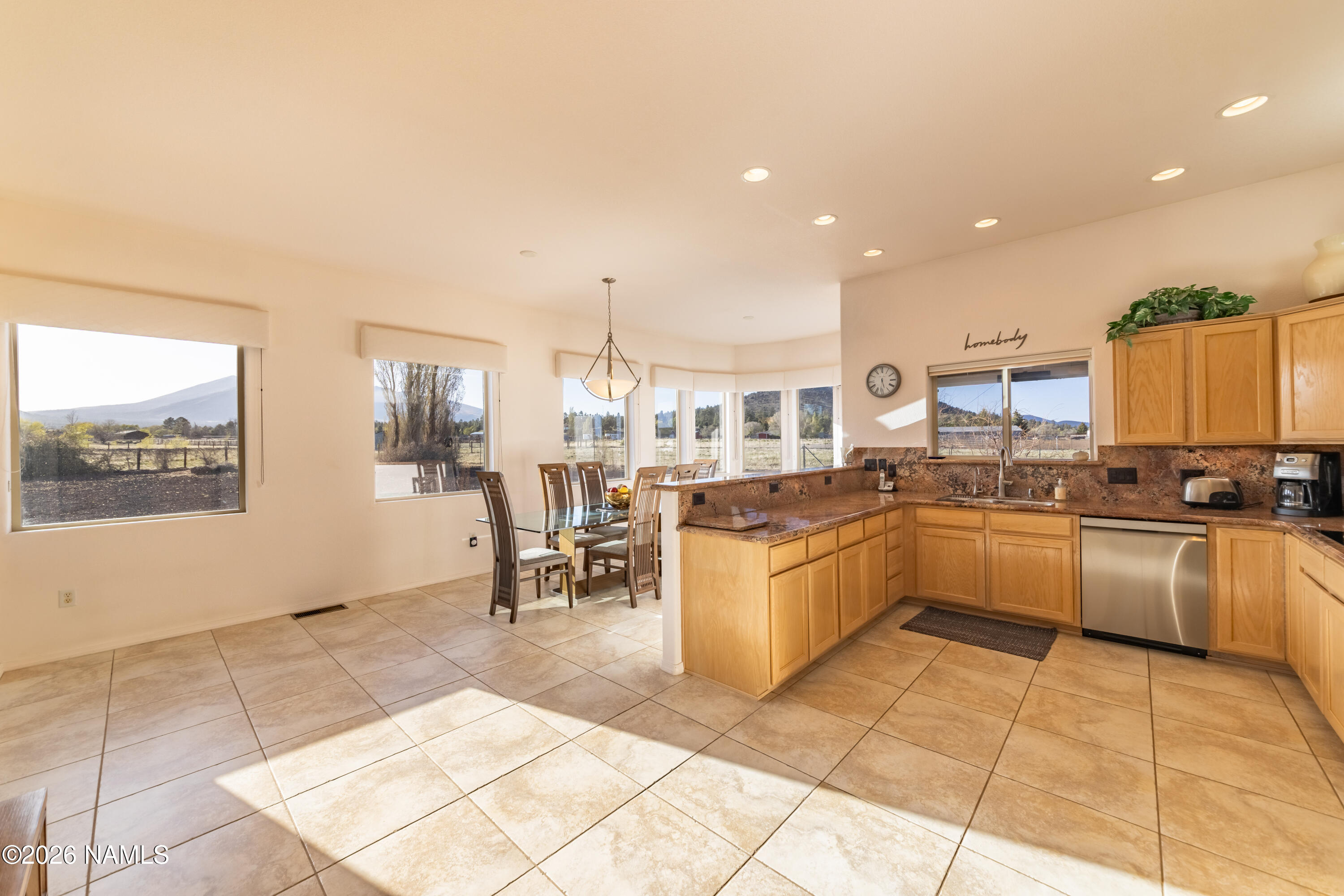 6875 Will O' Pete Road Flagstaff, AZ 86004 - Photo 17 of 43 a large kitchen with lots of counter top space and appliances