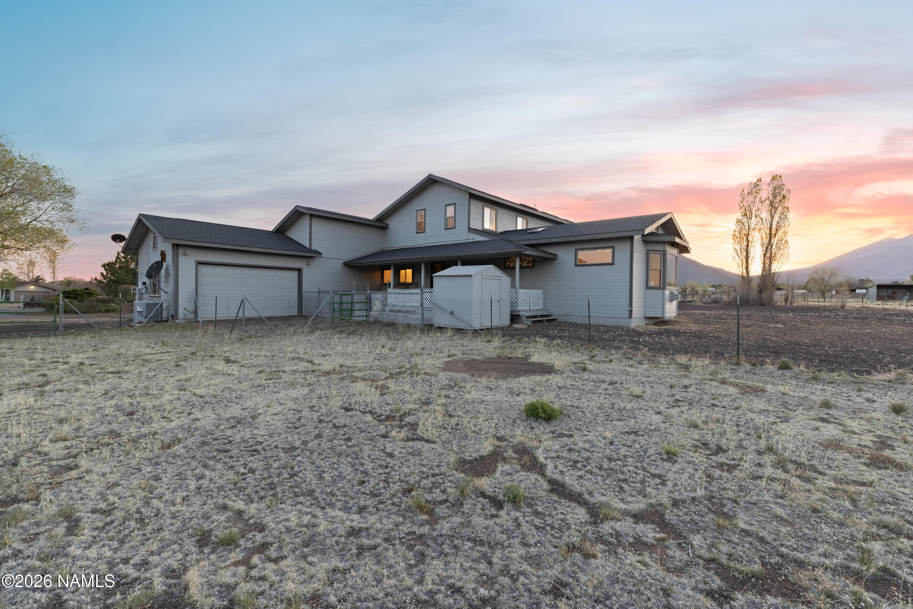 6875 Will O' Pete Road Flagstaff, AZ 86004 - Photo 18 of 43 a house view with a garden