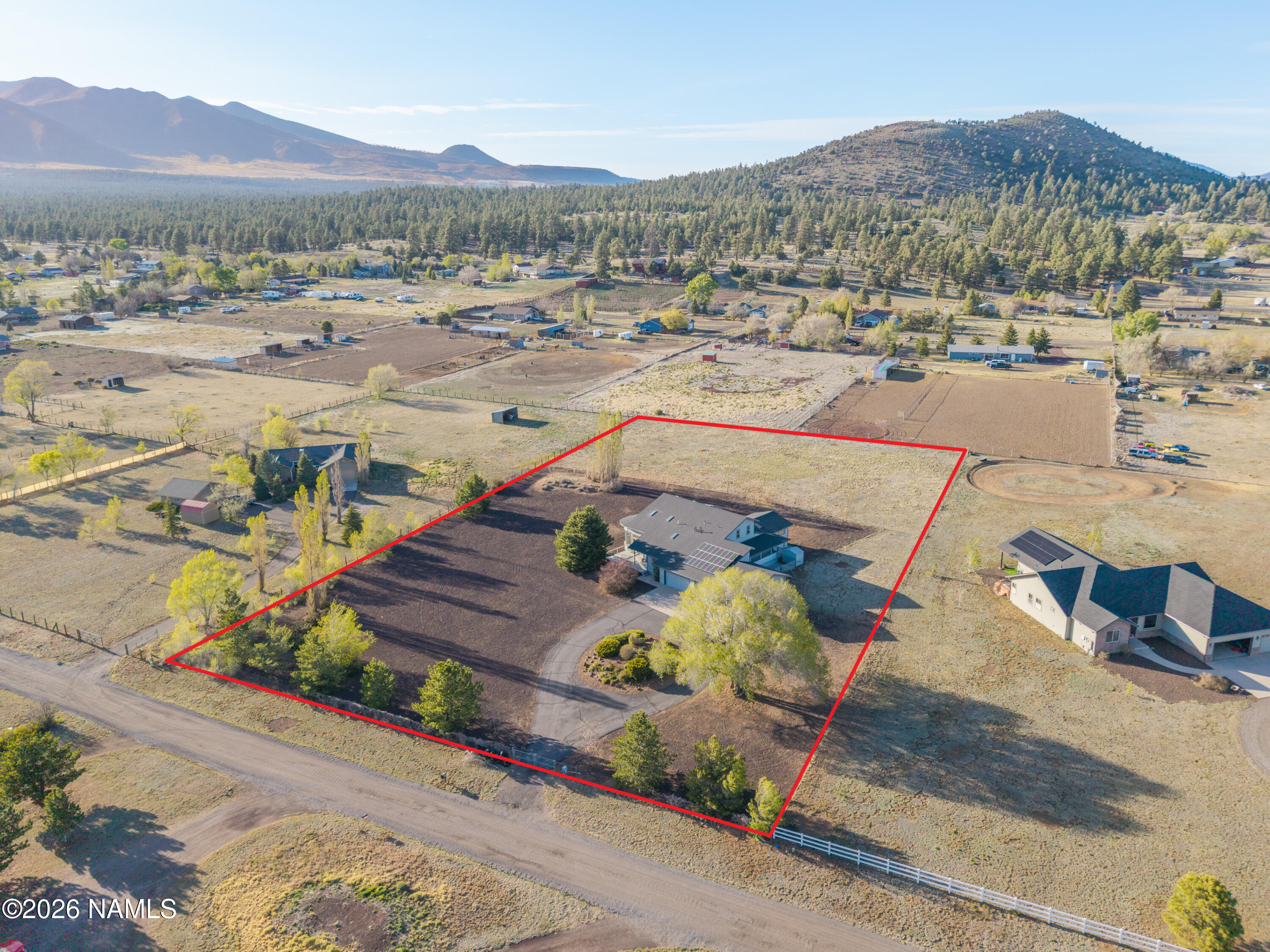 6875 Will O' Pete Road Flagstaff, AZ 86004 - Photo 2 of 43 an aerial view of residential houses with outdoor space