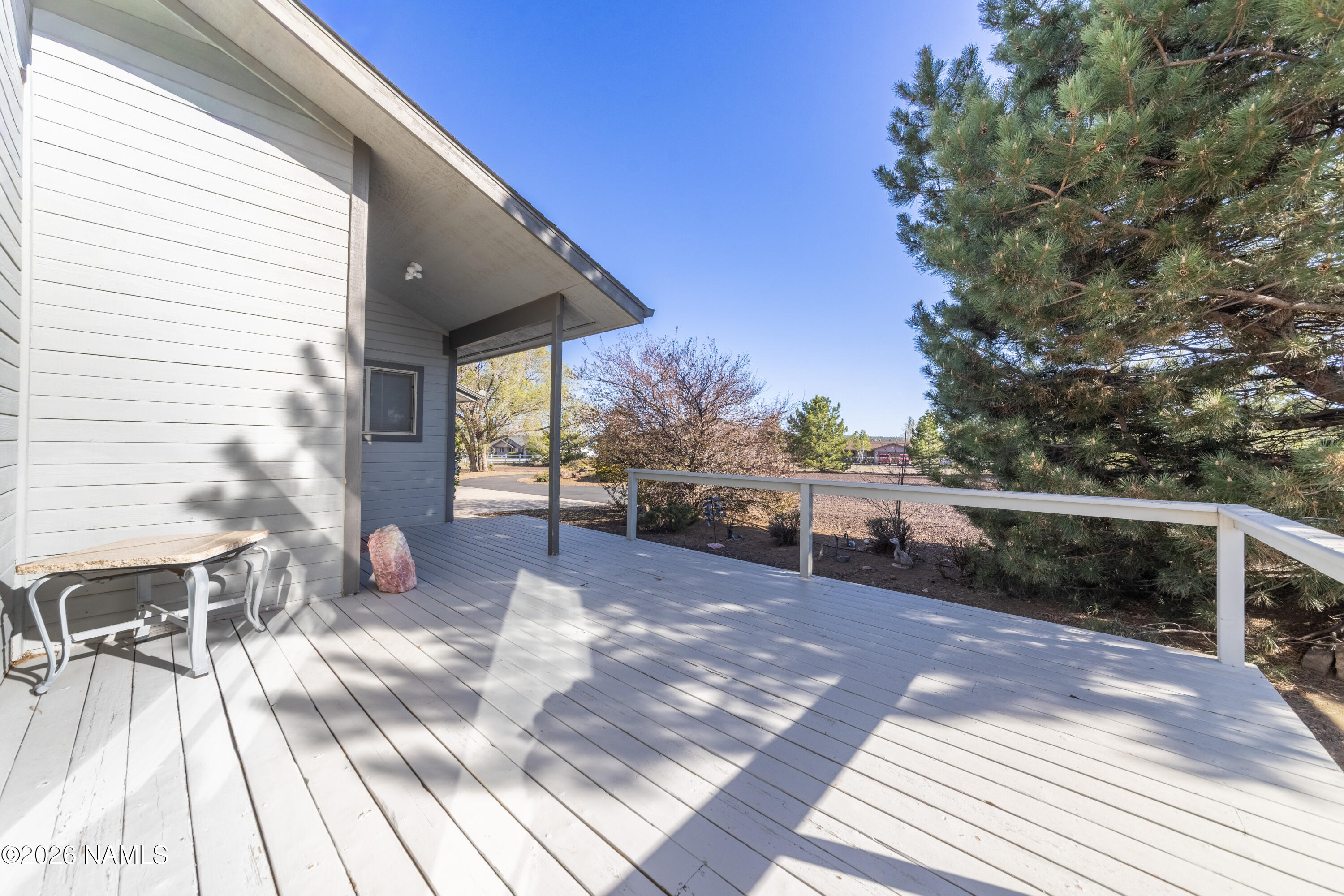 6875 Will O' Pete Road Flagstaff, AZ 86004 - Photo 22 of 43 a view of a backyard with sitting area