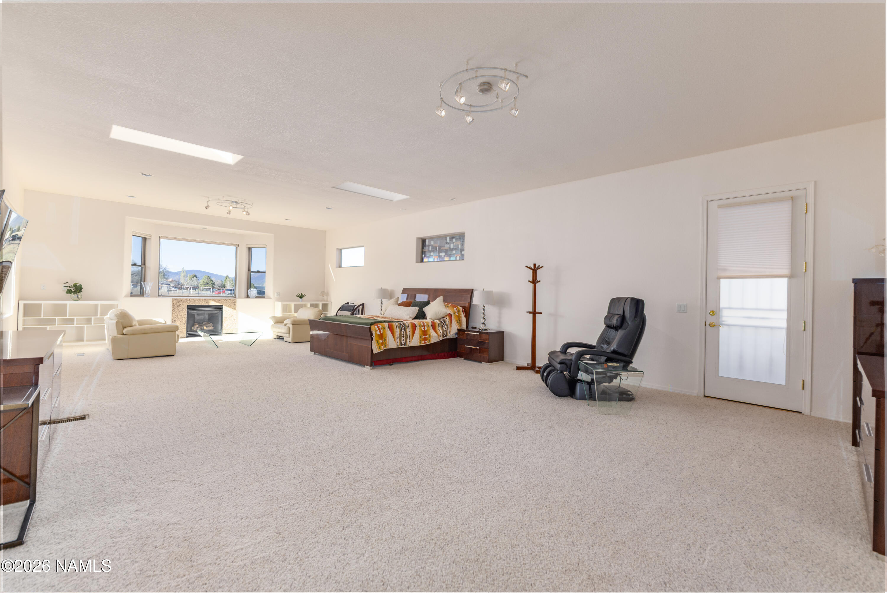 6875 Will O' Pete Road Flagstaff, AZ 86004 - Photo 23 of 43 a room with furniture and a gym equipment