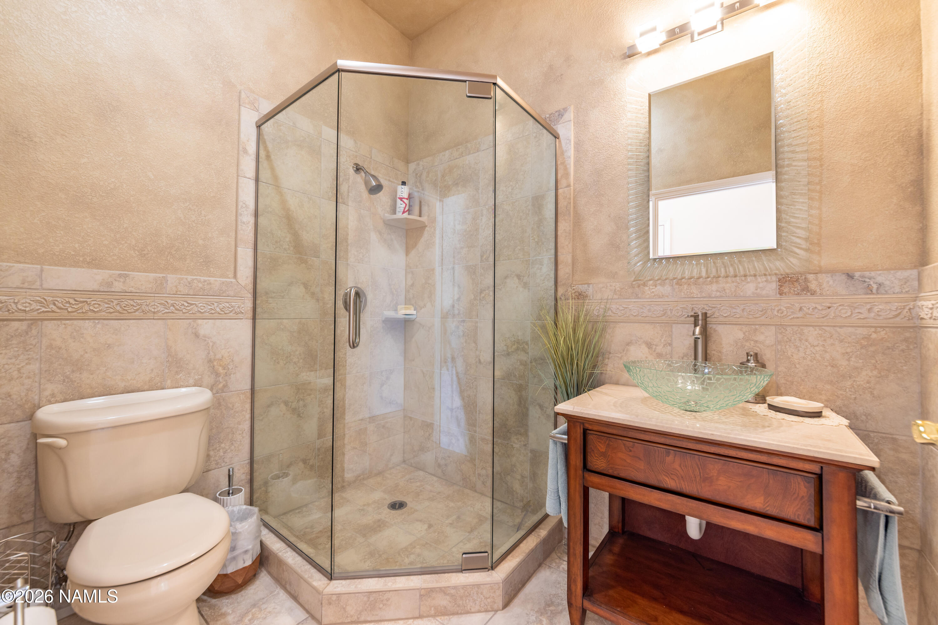 6875 Will O' Pete Road Flagstaff, AZ 86004 - Photo 29 of 43 a bathroom with a sink toilet and shower
