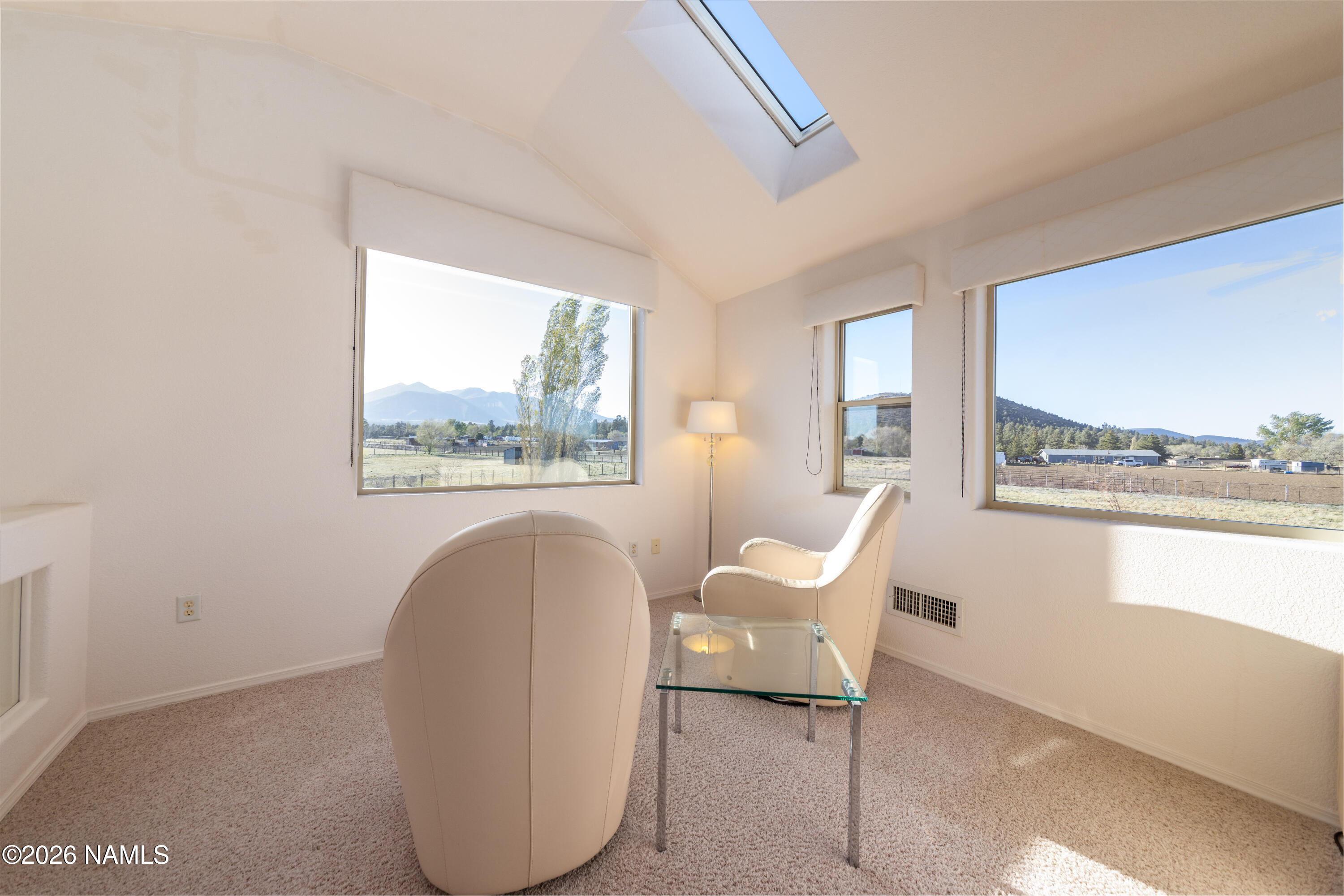 6875 Will O' Pete Road Flagstaff, AZ 86004 - Photo 31 of 43 a view of a room with furniture and windows