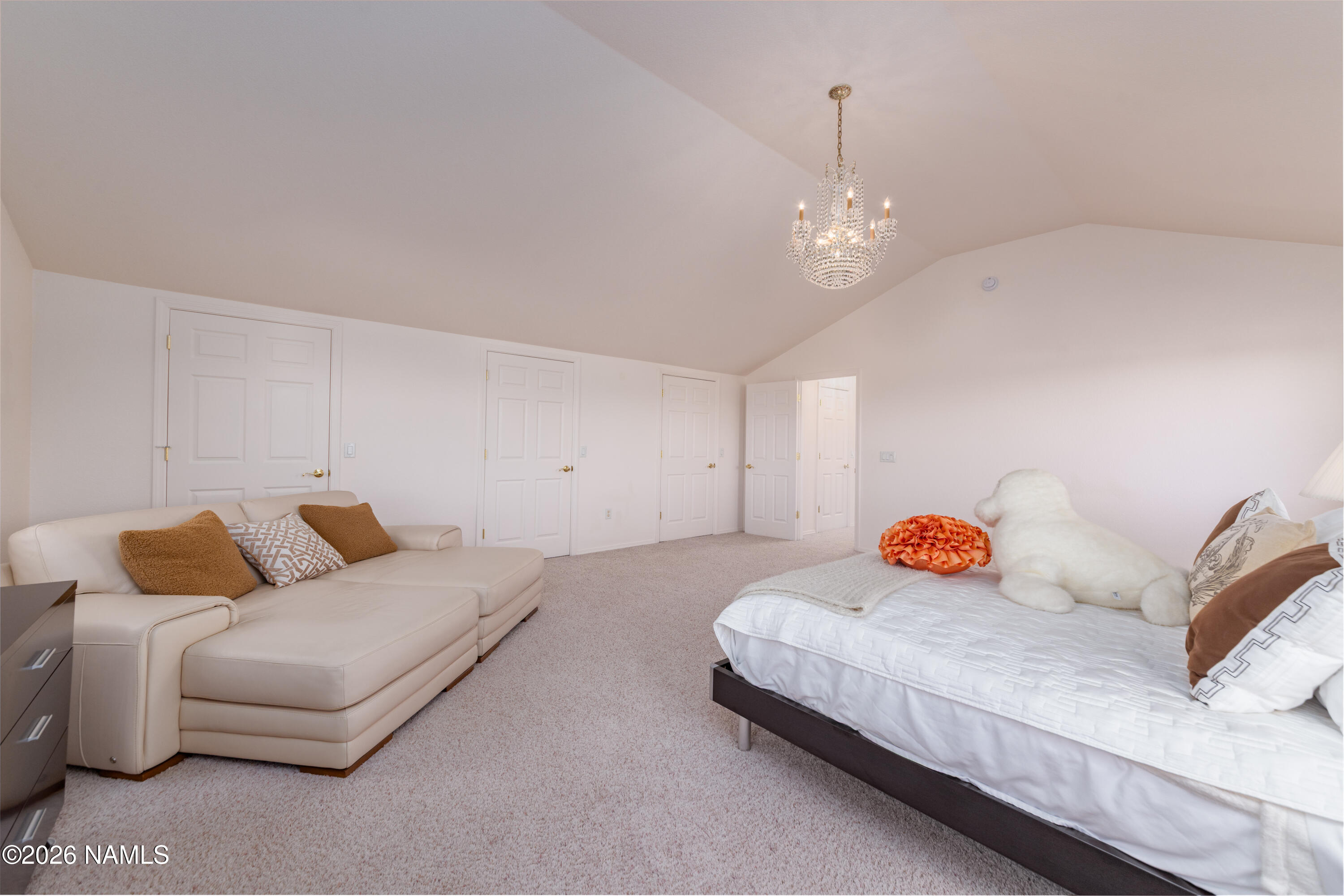 6875 Will O' Pete Road Flagstaff, AZ 86004 - Photo 35 of 43 a bedroom with a bed and ceiling fan