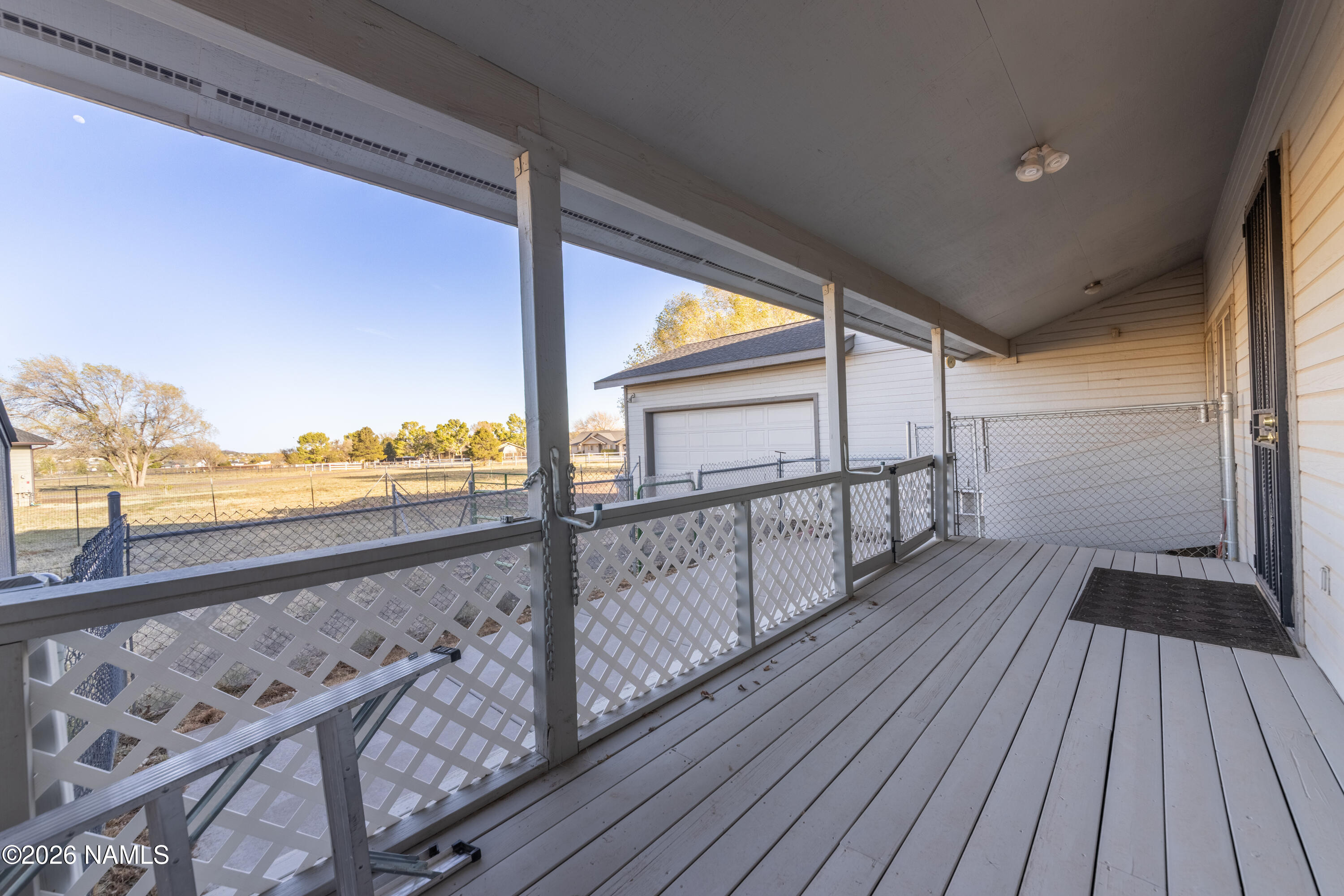 6875 Will O' Pete Road Flagstaff, AZ 86004 - Photo 40 of 43 a view of balcony with wooden floor