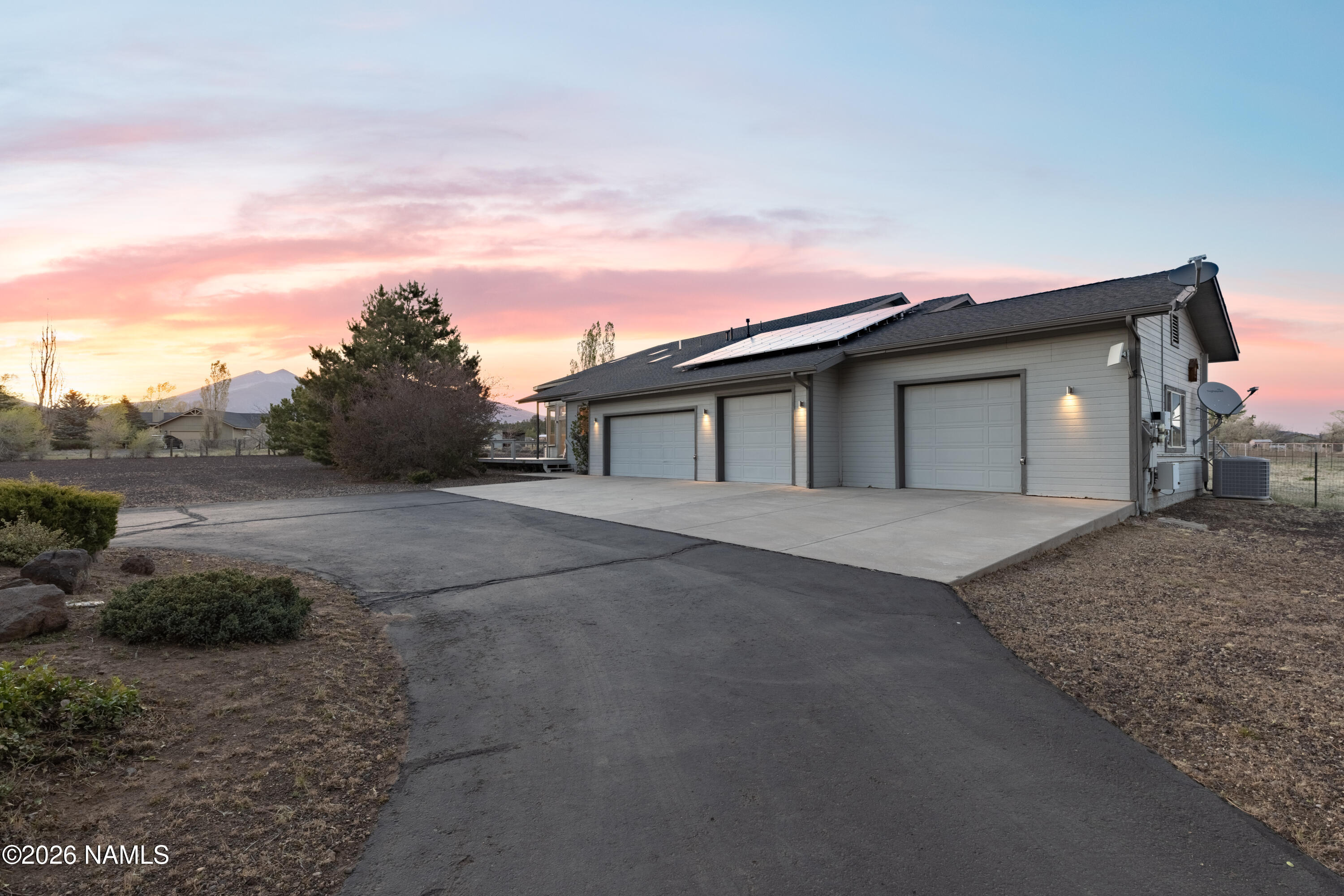 6875 Will O' Pete Road Flagstaff, AZ 86004 - Photo 5 of 43 a house with trees in the background