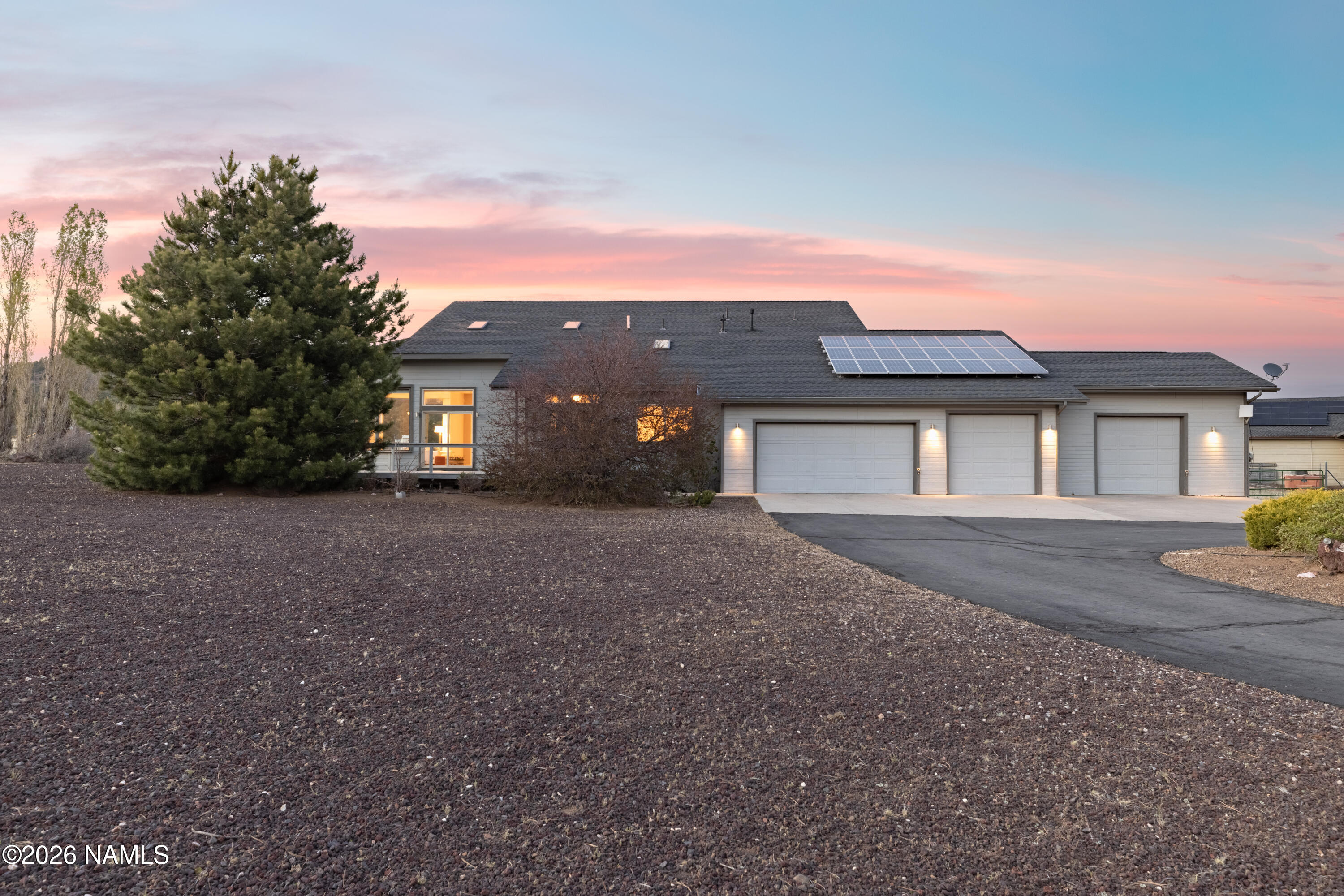 6875 Will O' Pete Road Flagstaff, AZ 86004 - Photo 6 of 43 a view of a house with a yard