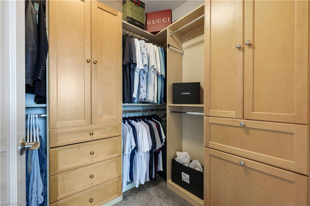 9123 Strada Place, Unit 7309 Naples, FL 34108 - Photo 11 of 46 a view of walk in closet