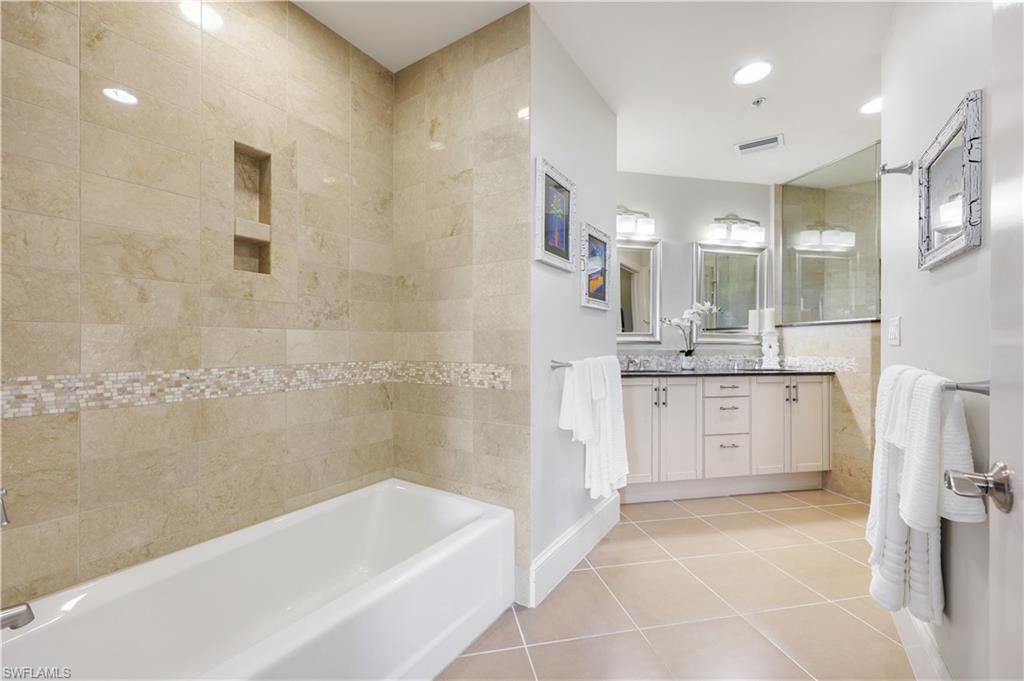 9123 Strada Place, Unit 7309 Naples, FL 34108 - Photo 12 of 48 Full bathroom featuring light tile patterned flooring, vanity, shower / bath combination, and recessed lighting