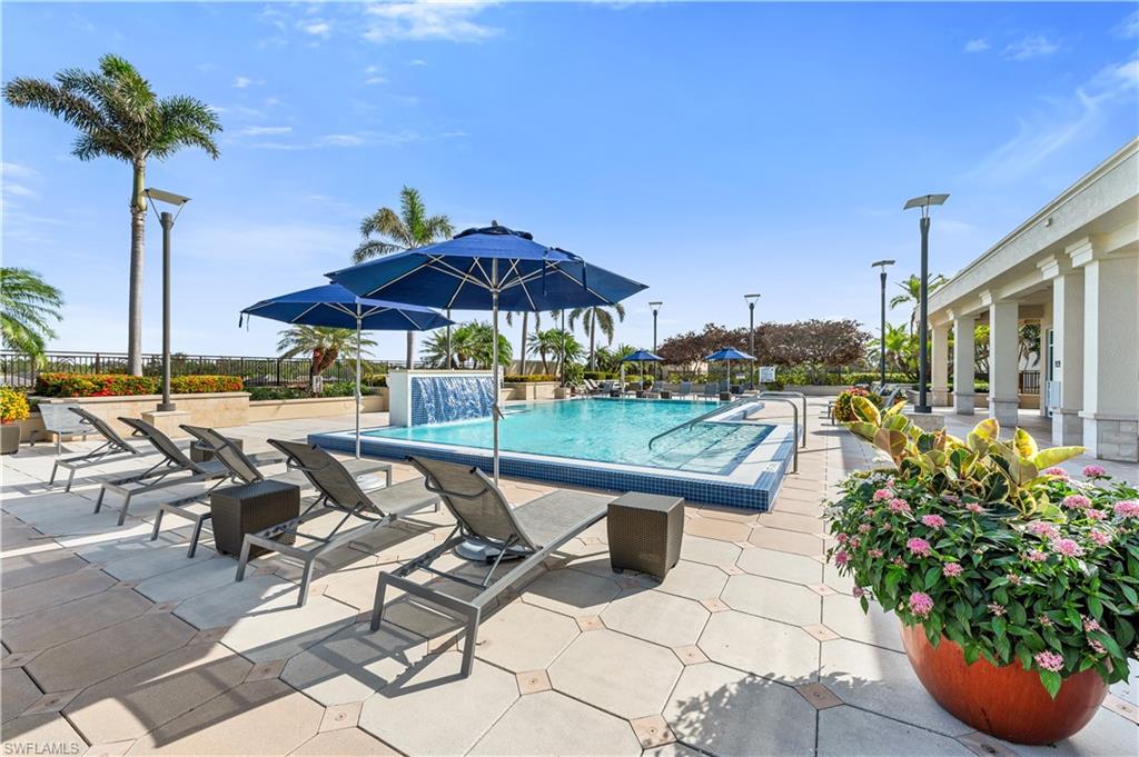 9123 Strada Place, Unit 7309 Naples, FL 34108 - Photo 18 of 46 a view of yard with patio