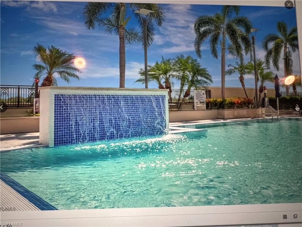 9123 Strada Place, Unit 7309 Naples, FL 34108 - Photo 20 of 46 a view of a backyard with plants