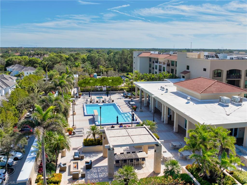 9123 Strada Place, Unit 7309 Naples, FL 34108 - Photo 22 of 46 an aerial view of a house with a yard