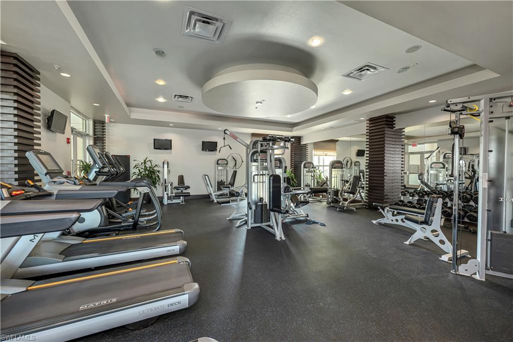 9123 Strada Place, Unit 7309 Naples, FL 34108 - Photo 27 of 46 a view of a room with gym equipment