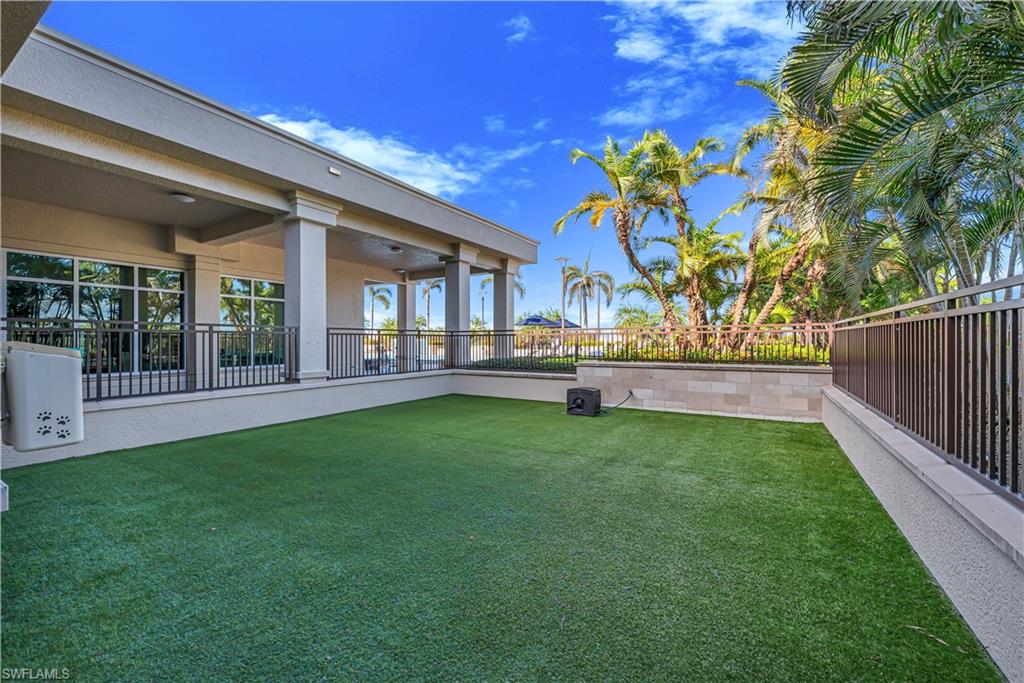 9123 Strada Place, Unit 7309 Naples, FL 34108 - Photo 31 of 46 a house view with a garden space