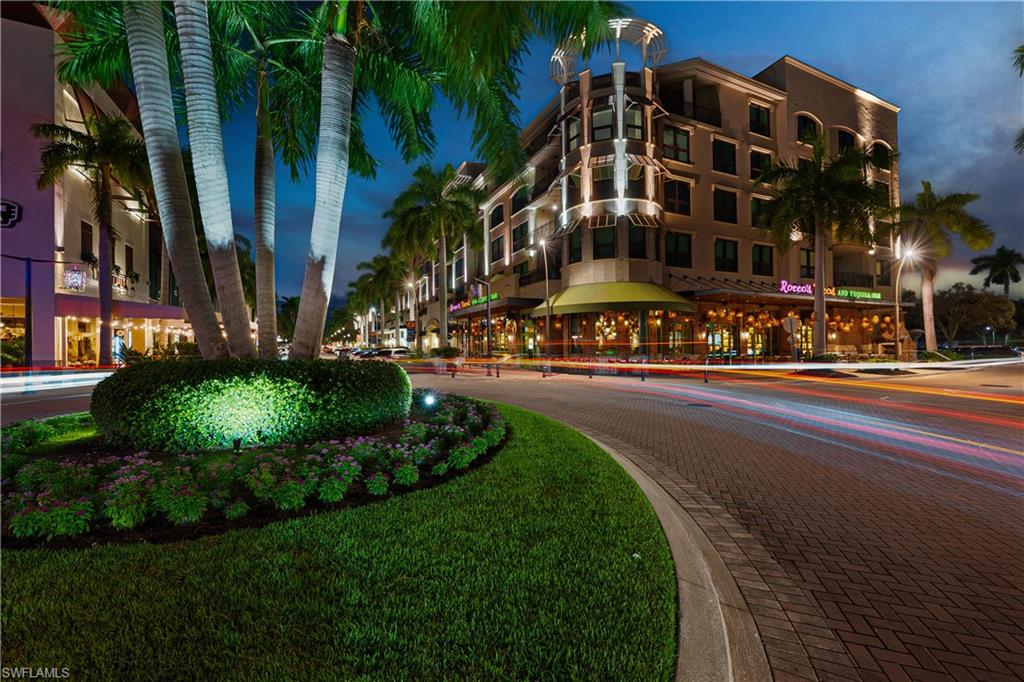 9123 Strada Place, Unit 7309 Naples, FL 34108 - Photo 37 of 46 a view of a building and a street