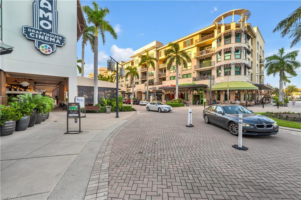 9123 Strada Place, Unit 7309 Naples, FL 34108 - Photo 38 of 46 a roof deck view with table and chairs