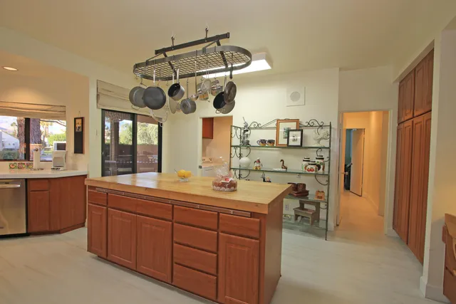 a bathroom with a double vanity sink mirror and shower