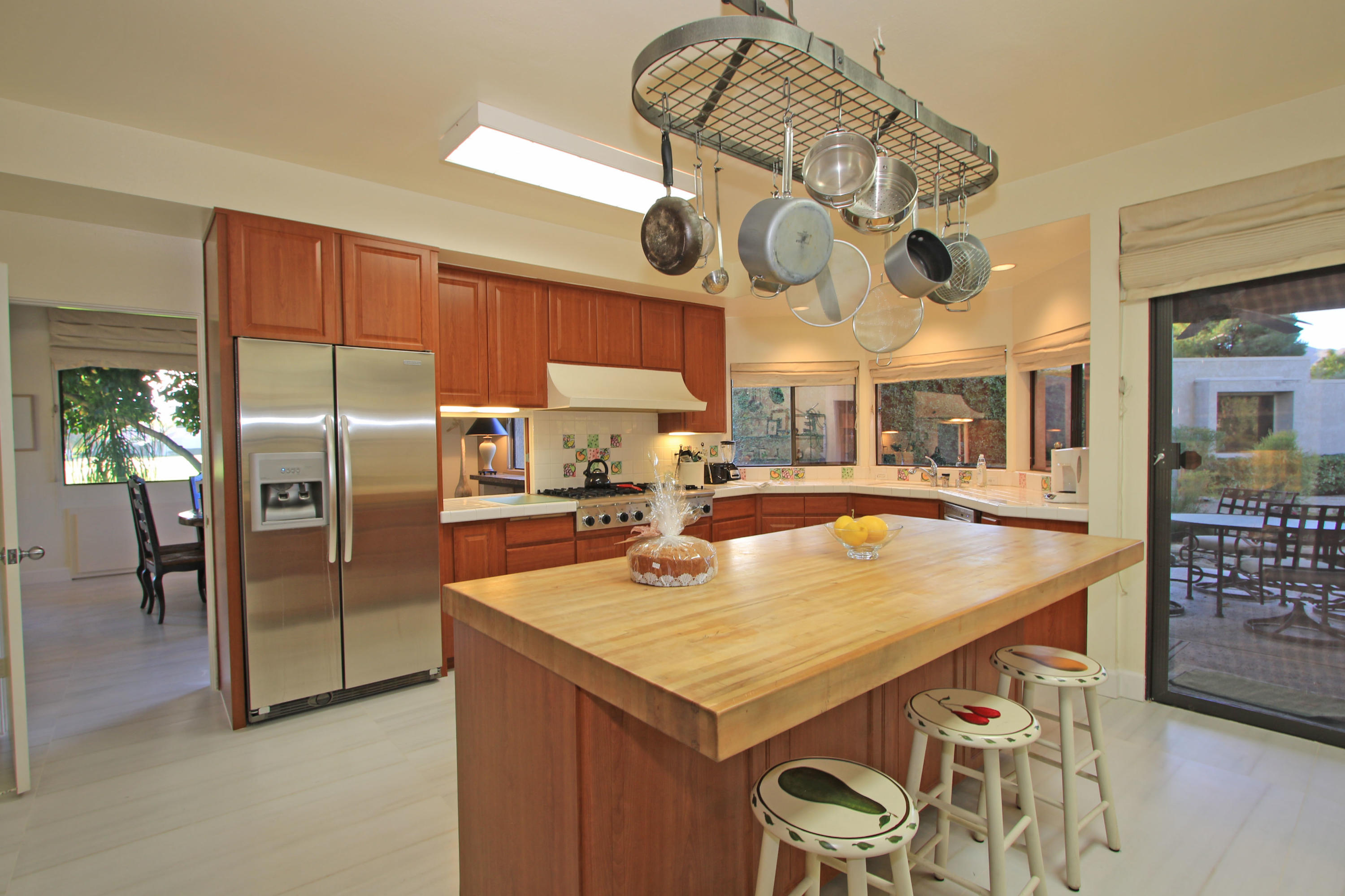 913 Inverness Drive Rancho Mirage, CA 92270 - Photo 15 of 52 a kitchen with a counter space cabinets and stainless steel appliances