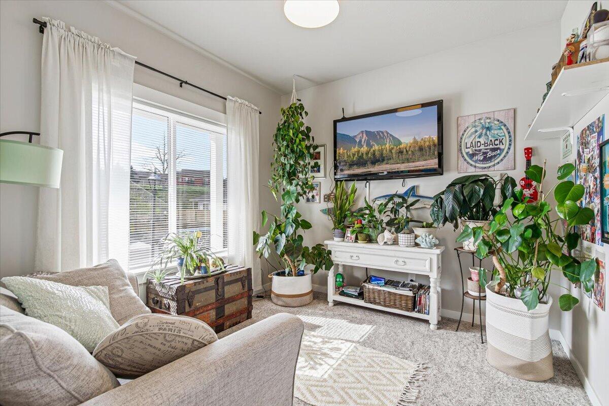 248 Christopher Way Talent, OR 97540 - Photo 18 of 33 a living room with furniture a fireplace and a potted plant