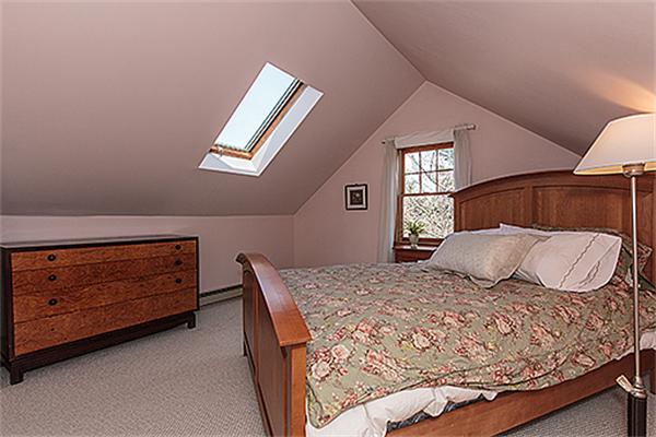35 Middle Street Lexington, MA 02421 - Photo 14 of 14 a bedroom with a bed and a window