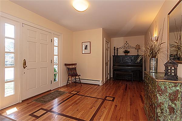 35 Middle Street Lexington, MA 02421 - Photo 2 of 14 a view of a livingroom with wooden floor