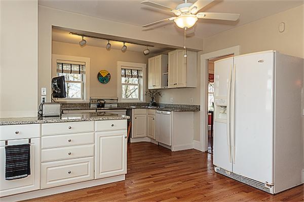 35 Middle Street Lexington, MA 02421 - Photo 5 of 14 a kitchen with white cabinets and white appliances
