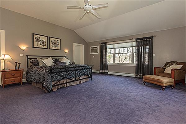 35 Middle Street Lexington, MA 02421 - Photo 8 of 14 a bed room with a bed and a chair