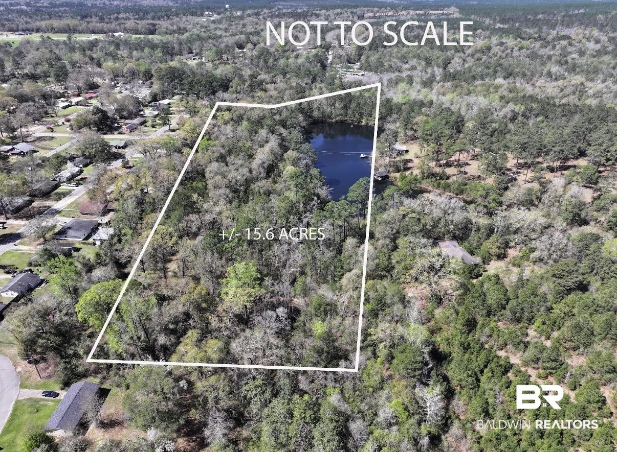 0 Fleming Lane Brewton, AL 36426 - Photo 2 of 18 View of property location with property boundaries highlighted and a large body of water