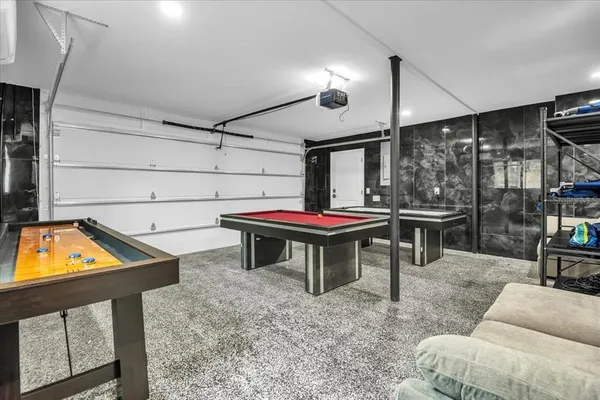 a living room with large windows