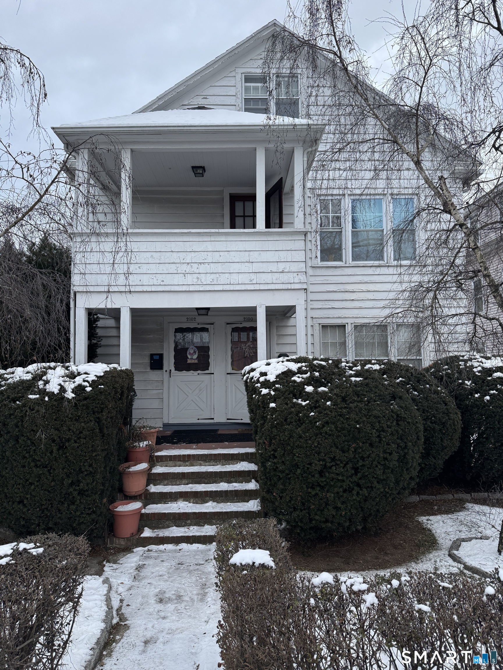 2100 East Main Street Bridgeport, CT 06610 - Photo 1 of 2 a front view of a house