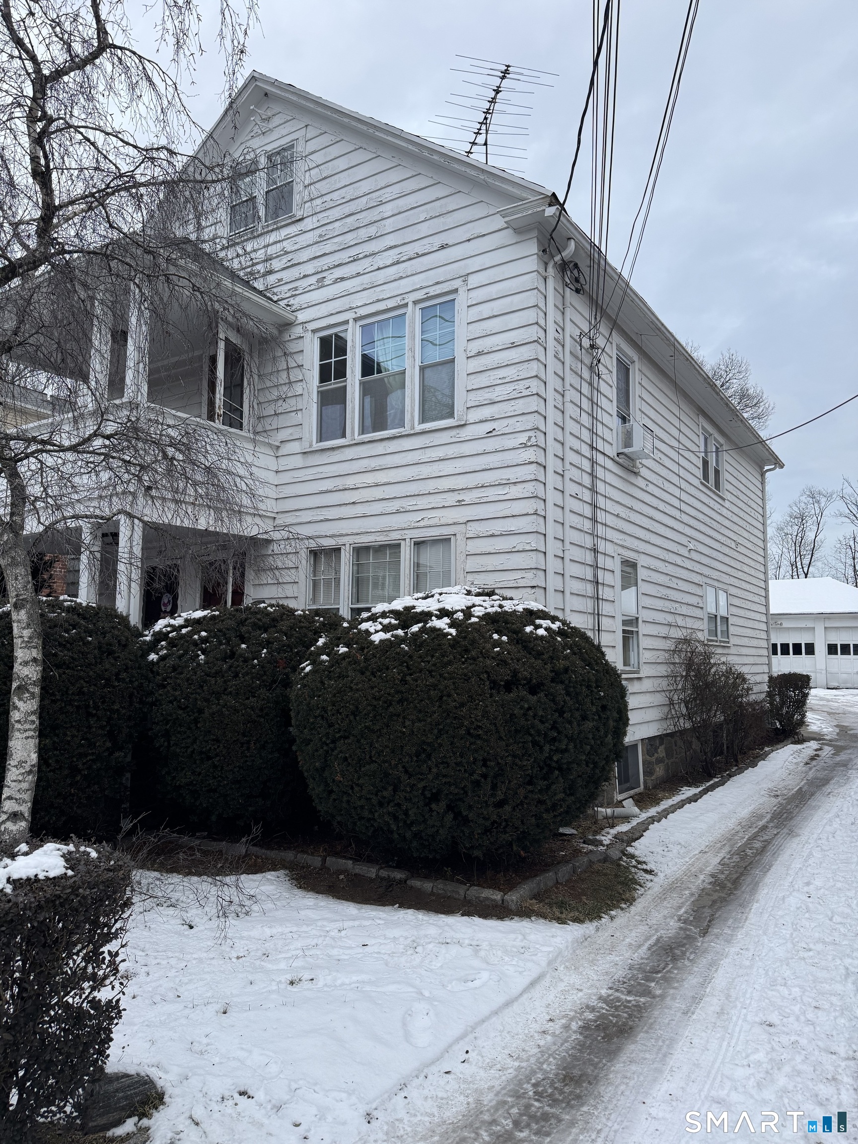 2100 East Main Street Bridgeport, CT 06610 - Photo 2 of 2 a front view of a house