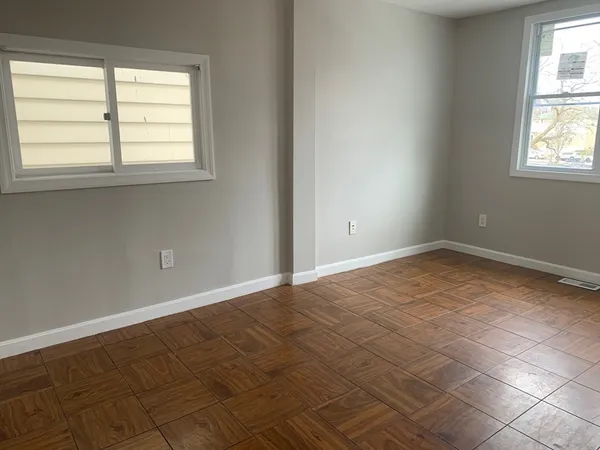 an empty room with windows