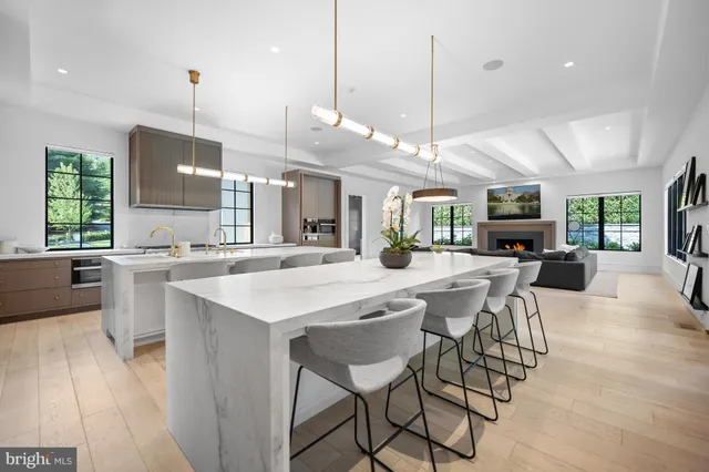a kitchen with a stove a sink and a refrigerator