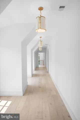 a view of entryway with washer and dryer