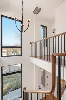 a white bath tub sitting next to a shower
