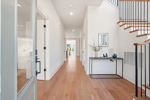 a view of a cafe with a lot of people on a road