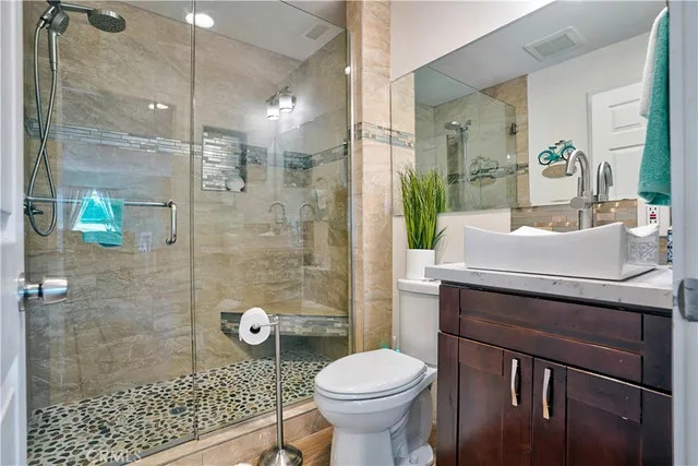 a bed room with a bed and a large window