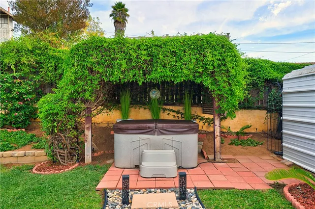 an aerial view of a houses with outdoor space