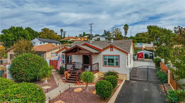 a view of a deck with wooden floor and outdoor seating