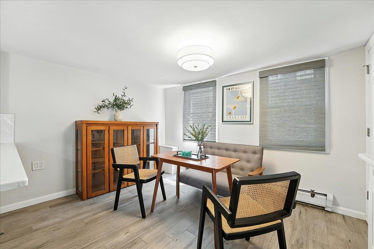 221 Terrace Avenue Jersey City, NJ 07307 - Photo 11 of 37 a dining room with furniture and window