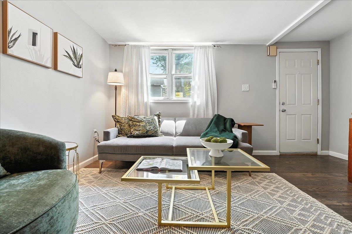 221 Terrace Avenue Jersey City, NJ 07307 - Photo 2 of 37 a living room with furniture and a window