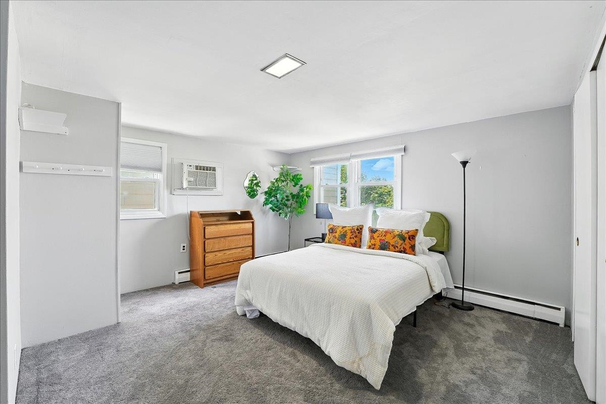 221 Terrace Avenue Jersey City, NJ 07307 - Photo 28 of 37 a bedroom with bed and a window