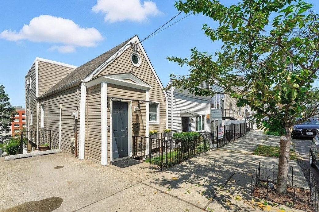 221 Terrace Avenue Jersey City, NJ 07307 - Photo 35 of 37 a view of house with a outdoor space
