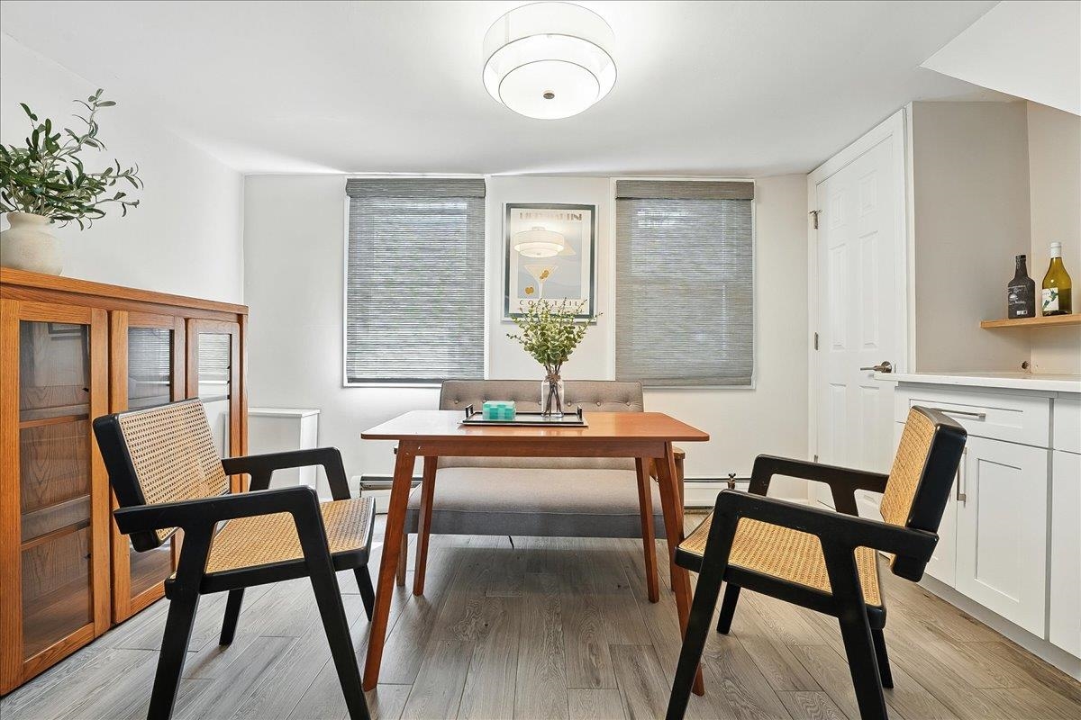 221 Terrace Avenue Jersey City, NJ 07307 - Photo 6 of 37 a dining room with furniture and window