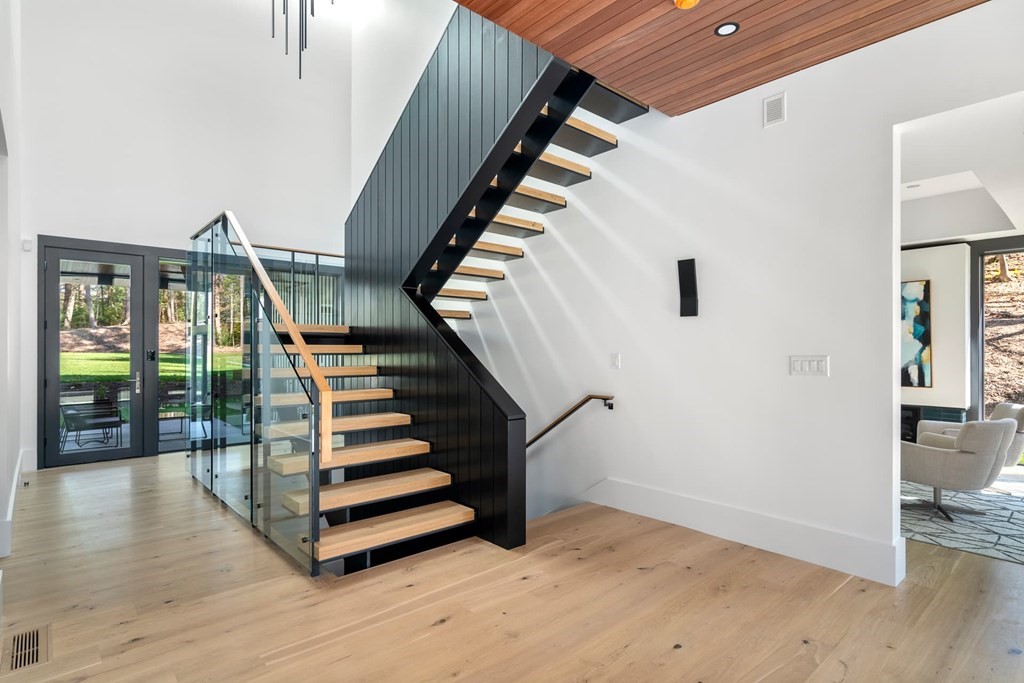 101 Black Oak Road Weston, MA 02493 - Photo 18 of 42 a view of entryway and hall with wooden floor