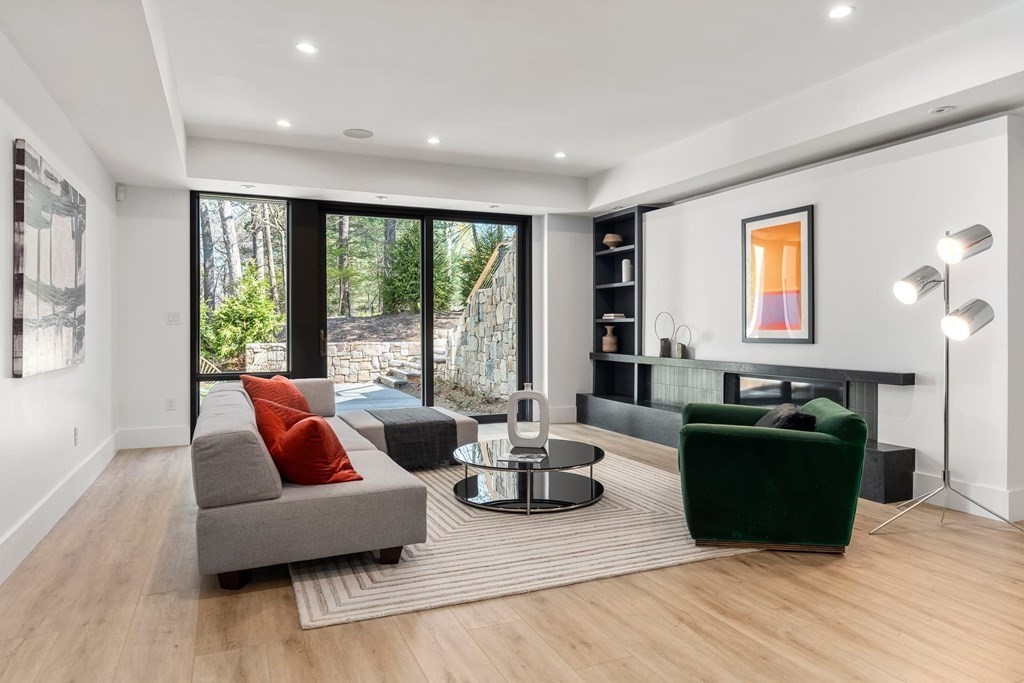 101 Black Oak Road Weston, MA 02493 - Photo 29 of 42 a living room with furniture and a flat screen tv