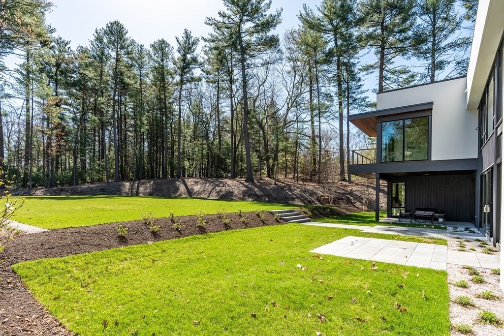 101 Black Oak Road Weston, MA 02493 - Photo 36 of 42 a view of swimming pool with lawn chairs and plants