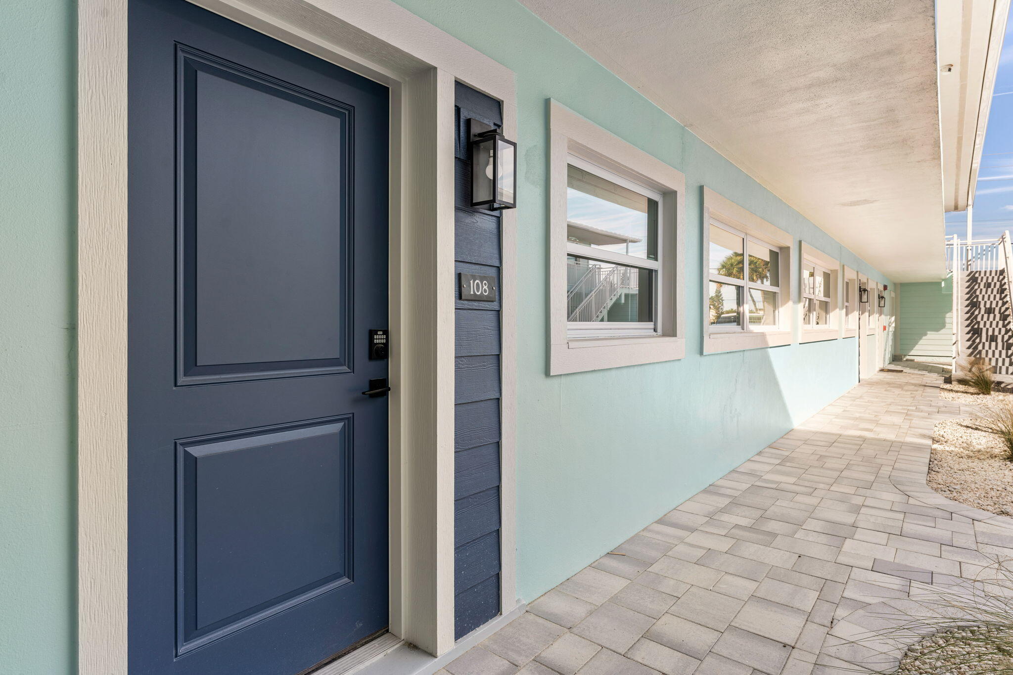 120 Central Road, Unit 118 Indian Harbour Beach, FL 32937 - Photo 10 of 14 a view of a brick house with windows